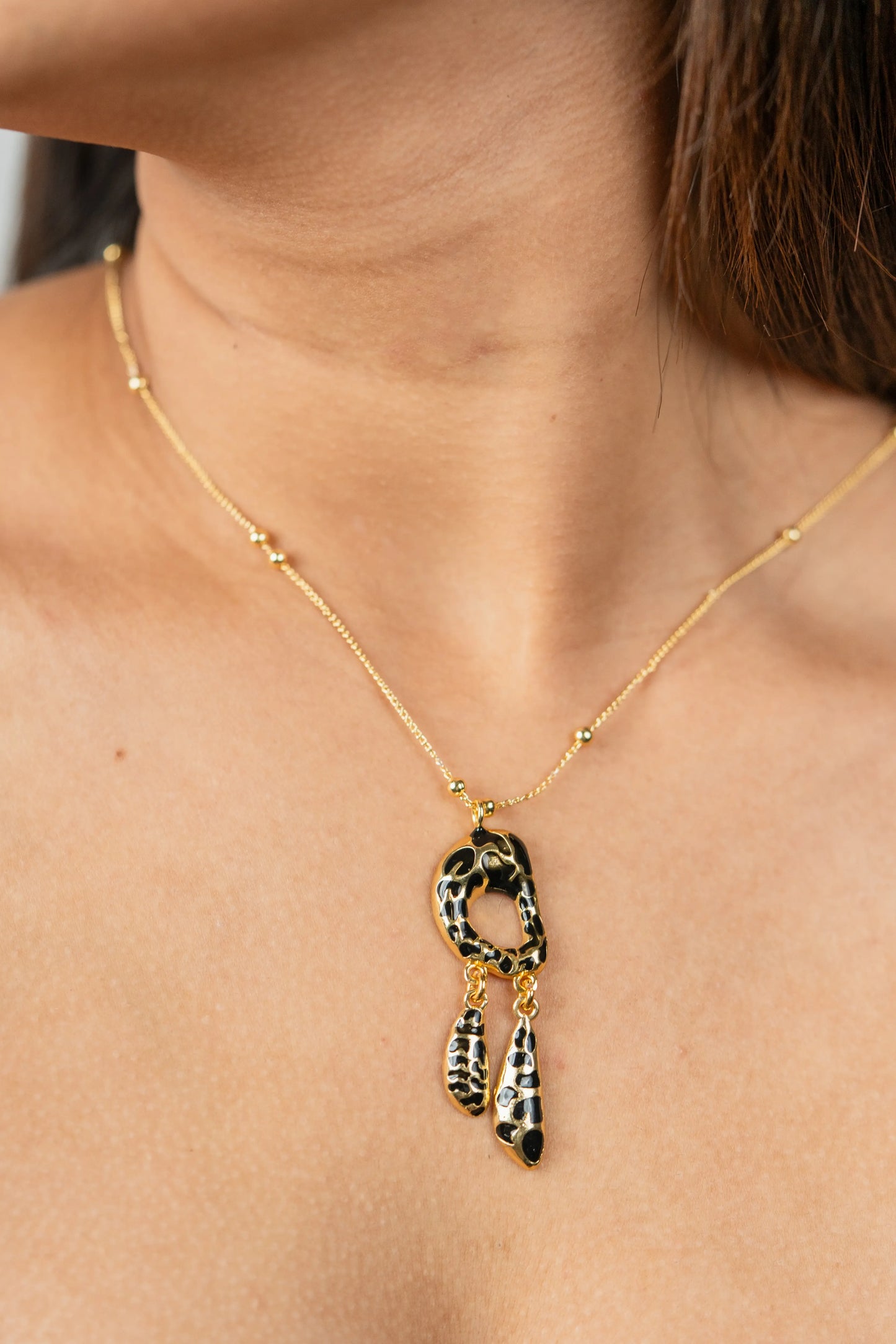 Golden Claw Pendant